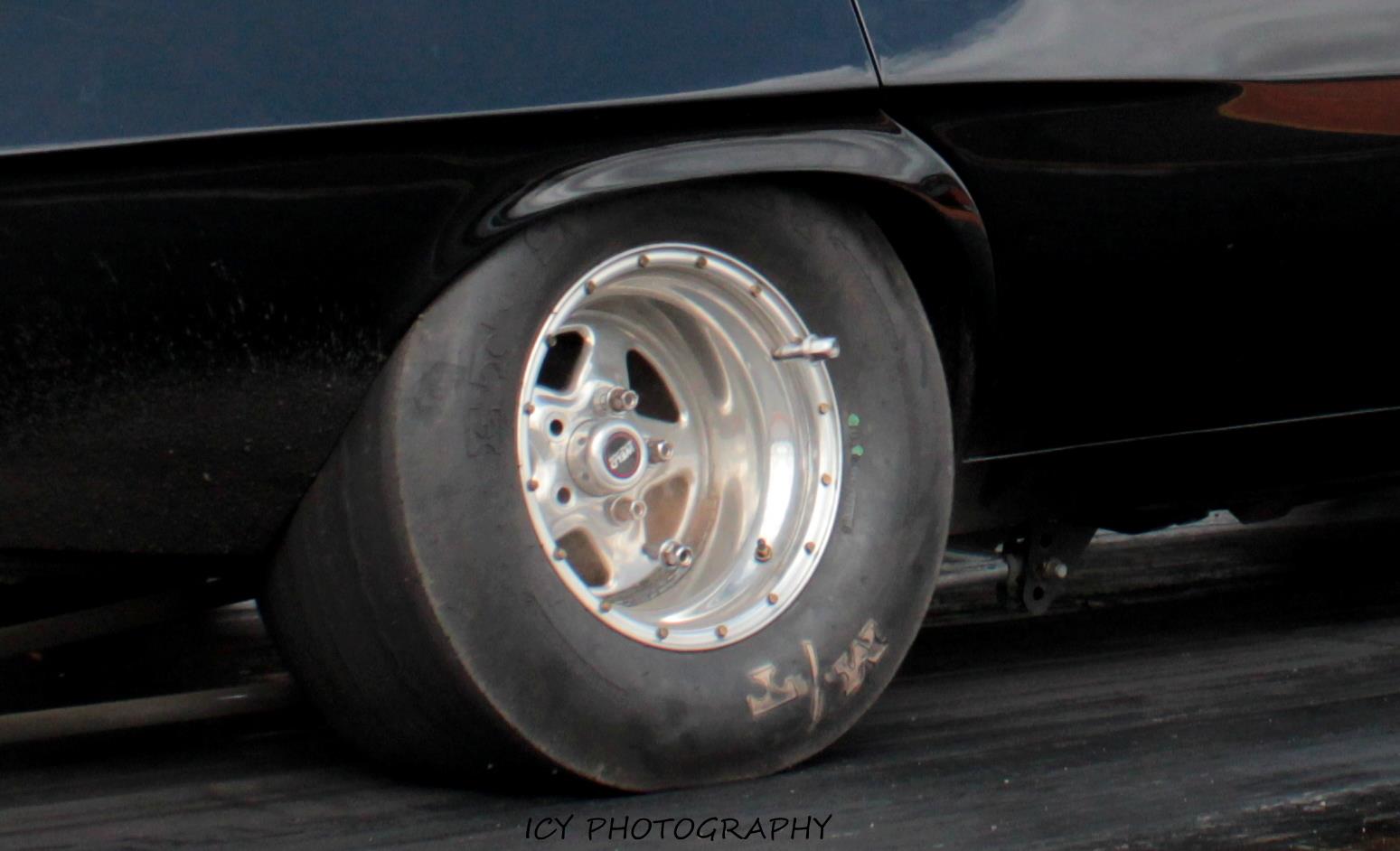 Attached picture broken wheel studs flying off.jpg